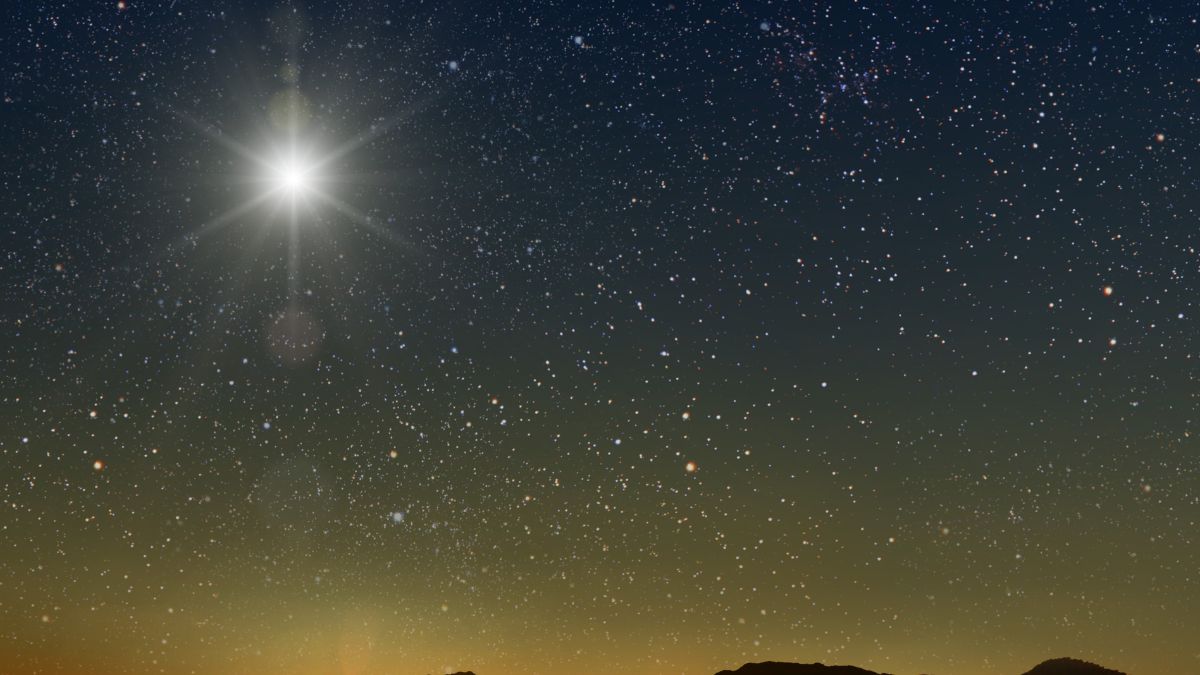 Az Esthajnalcsillag ragyogó fénye a csillagos égen, háttérben a sötét égbolt.