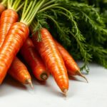 Friss sárgarépák zöld levélzetével, egészséges táplálkozás