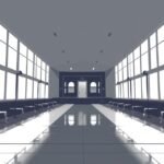 Modern üres belső tér világos ablakokkal és padokkal.